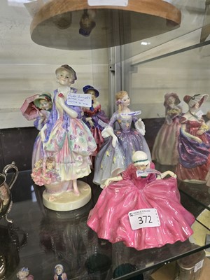 Lot 372 - Five assorted Royal Doulton ceramic figurines '...