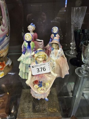 Lot 376 - Five Royal Doulton ceramic figurines 'Lucy Ann'...