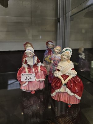 Lot 384 - Five Royal Doulton ceramic figurines 'Peggy'...