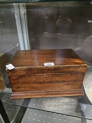 Lot 389 - A sewing box containing an assortment of...