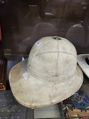 Lot 390 - A 20th century white pith helmet