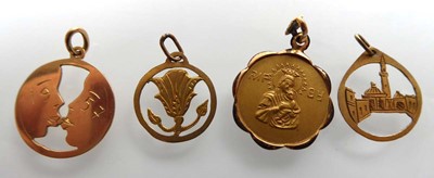 Lot A yellow metal pendant depicting the Madonna...