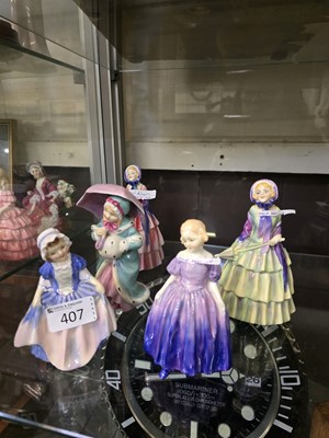 Lot 407 - Five Royal Doulton ceramic figurines 'Dinky Do'...