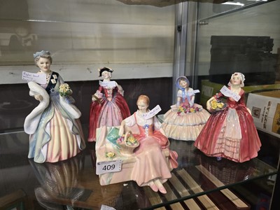 Lot 409 - Five Royal Doulton ceramic figurines 'Queen...