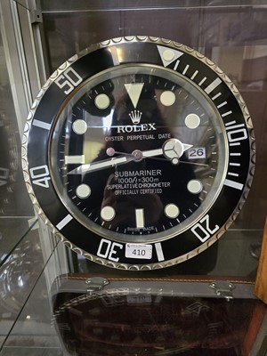 Lot 410 - A 'Rolex' style Submariner design wall clock...