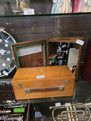 Lot 411 - A cased microscope along with a Mark II viewer