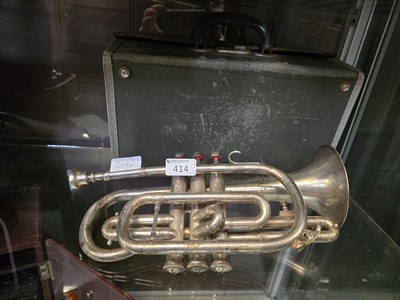 Lot 414 - A three valve 'Regent' trumpet by Boosey and...