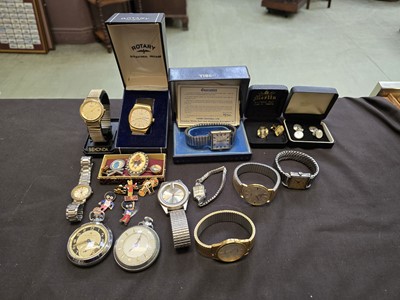 Lot 434 - A box containing a quantity of modern watches...