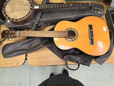 Lot 478 - An acoustic guitar