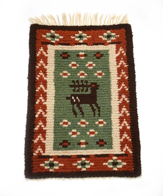 Lot 68 - A small 1960's Swedish rya rug decorated with...