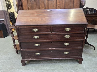 Lot 24 - A Georgian mahogany fall front bureau having a...