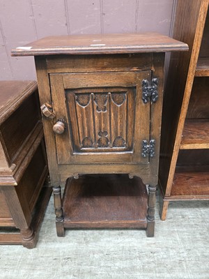 Lot 40 - A mid-20th century oak hall cupboard with...