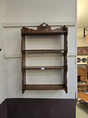 Lot 57 - An early 20th century wall mounted set of shelves