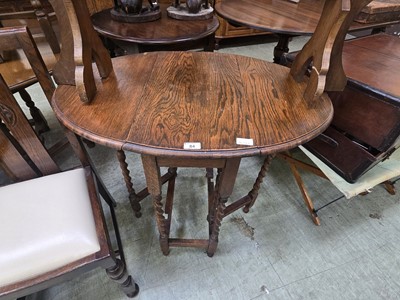 Lot 84 - An early 20th century oval gate leg table on...