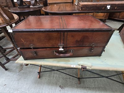 Lot 85 - A late 19th century leather travelling trunk...