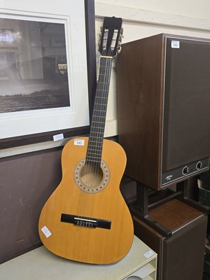 Lot 141 - An acoustic guitar