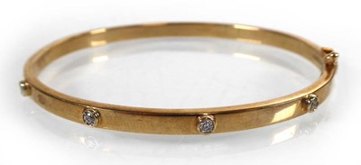 Lot A 9ct yellow gold hinged bracelet set paste,...