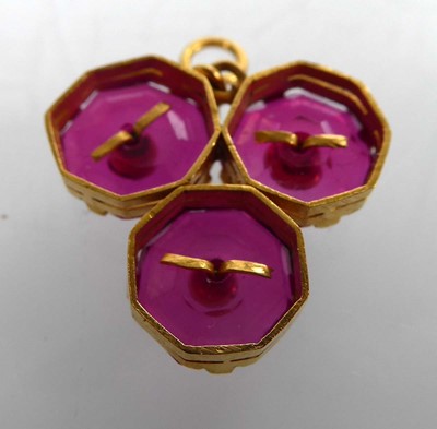 Lot A yellow metal pendant set three octagonal cut...