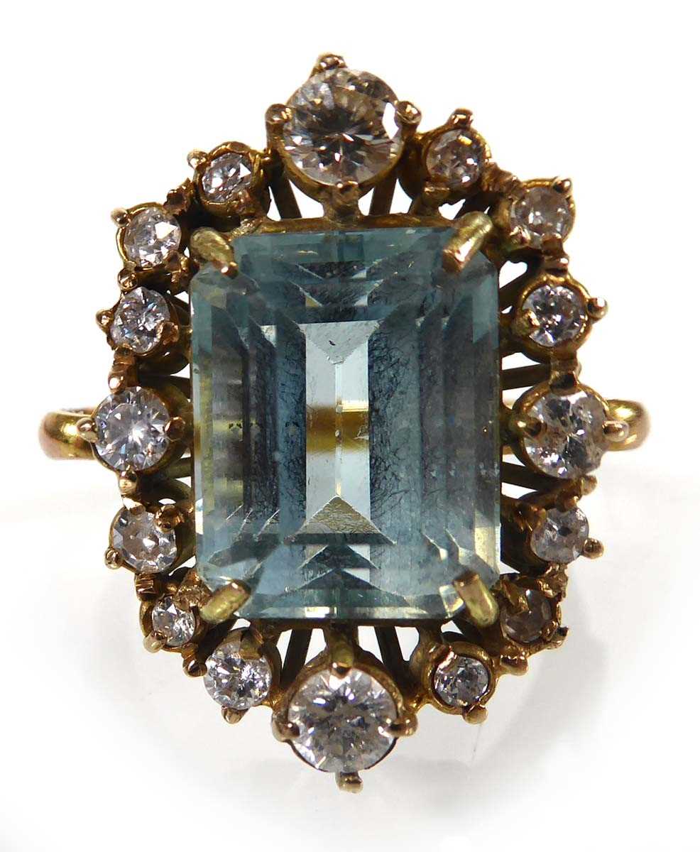 Lot 808 - A yellow metal ring set rectangular cut...