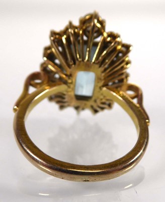 Lot 808 - A yellow metal ring set rectangular cut...