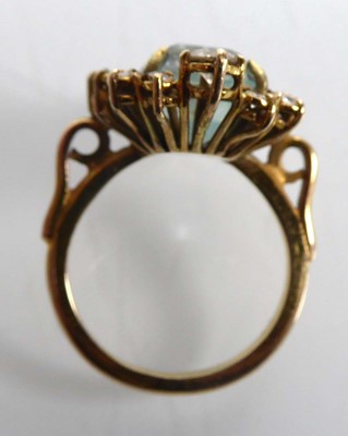 Lot 808 - A yellow metal ring set rectangular cut...