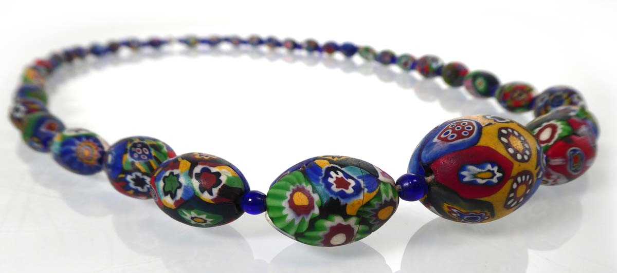 Lot 812 - A graduated Murano millefiori glass bead...