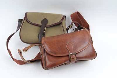 Lot 1030 - Leather cartridge bag and canvas cartridge bag