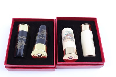 Lot 1056 - Two sets of ceramic shotgun cartridges