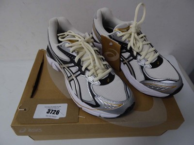 Lot Boxed pair of Asics trainers, silver, UK 5.5