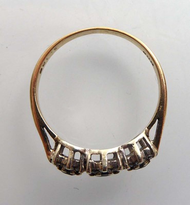 Lot A 9ct yellow gold ring set three small...