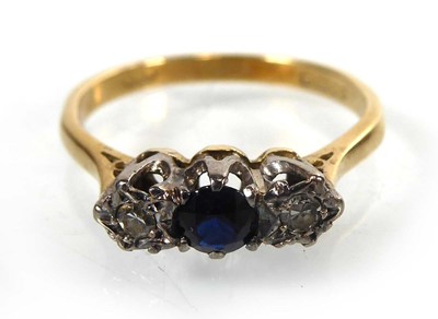 Lot An 18ct yellow gold ring set sapphire and two...