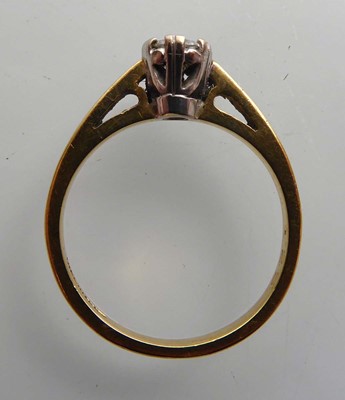 Lot An 18ct yellow gold ring set brilliant cut...