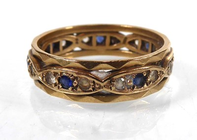 Lot A 9ct yellow gold eternity ring set sapphire...