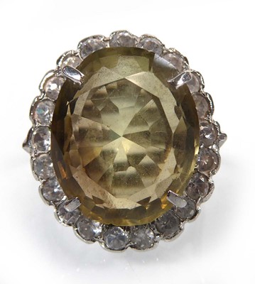 Lot A silver cluster ring set oval citrine within...