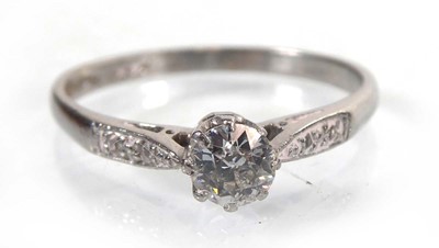 Lot A platinum ring set brilliant cut diamond in...