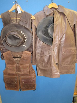 Lot 1252 - Jim Stirling (Australia) leather coat (size...