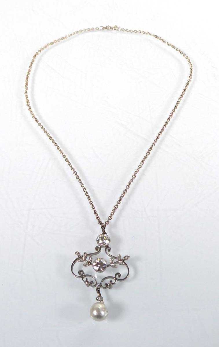 Lot A silver fine chainlink necklace suspending a...