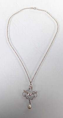 Lot A silver fine chainlink necklace suspending a...