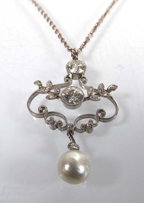 Lot A silver fine chainlink necklace suspending a...