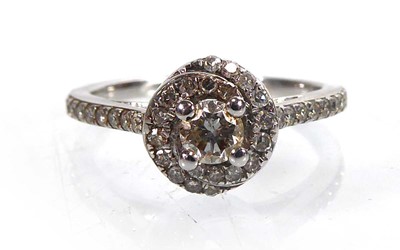 Lot A 9ct white gold halo ring set small diamonds,...