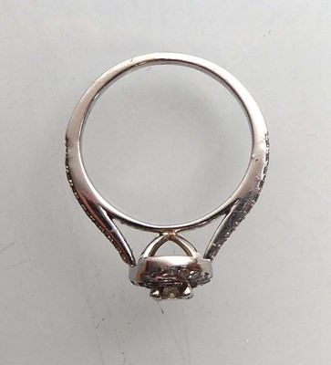 Lot A 9ct white gold halo ring set small diamonds,...