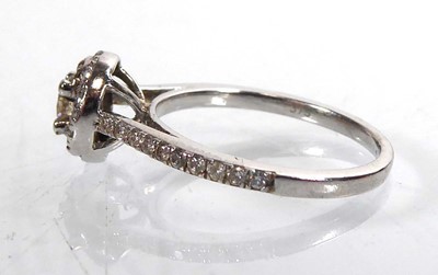 Lot A 9ct white gold halo ring set small diamonds,...