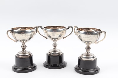 Lot 34 - Set of three miniature silver trophies for the...