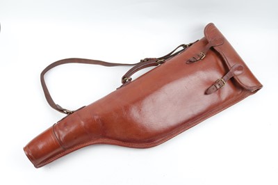 Lot 38 - Tan leather take-down shotgun case by Brady,...