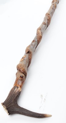 Lot 1090 - Honeysuckle twist walking stick with antler...