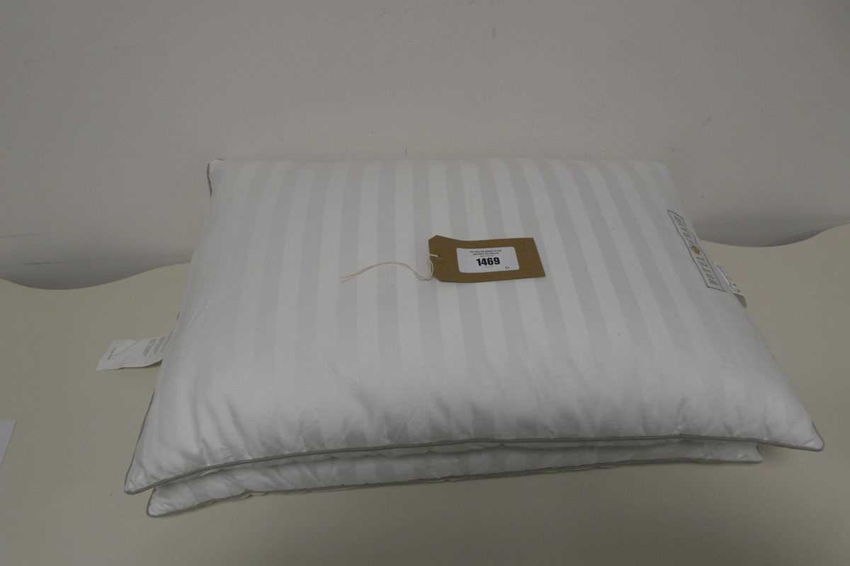 Lot 1469 - A pair of Hotel Grand feather and down pillows.