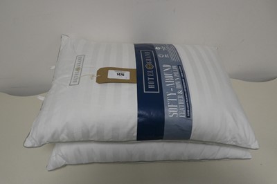 Lot 1476 - A pair of Hotel Grand feather and down pillows.