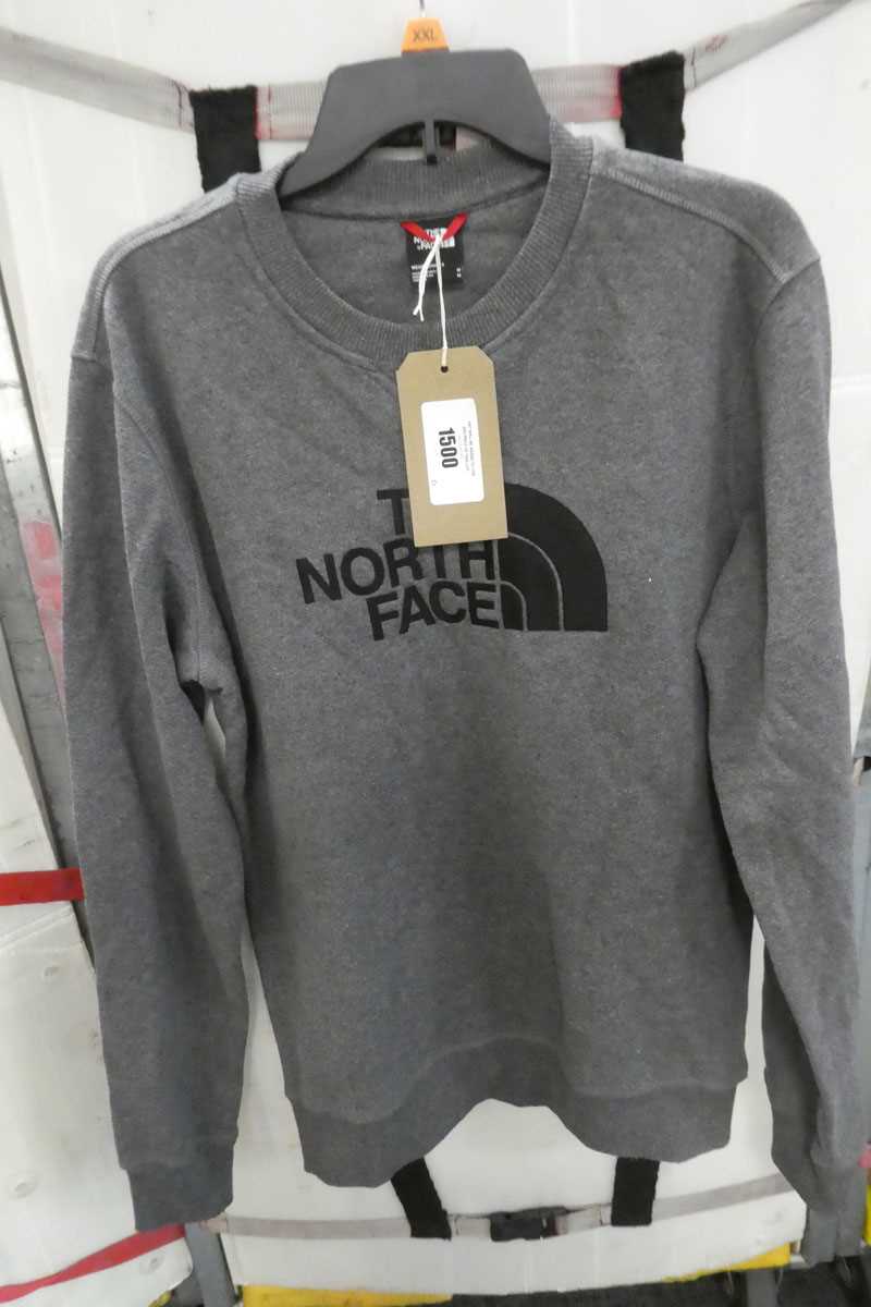 Lot 1500 - A men's North Face jumper in grey. Size: Medium