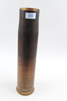 Lot 1113 - A 105mm German artillery shell case, stamped...