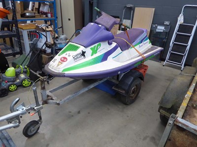 Lot 4257 - Twin carb XP jet ski with single axle trailer...